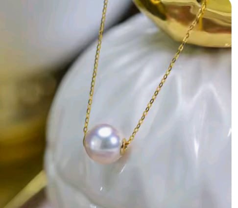 A single pearl, a timeless symbol of grace and sophistication.Perfect for every occasion